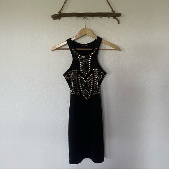 boutique Dresses & Skirts - Black and gold mini dress